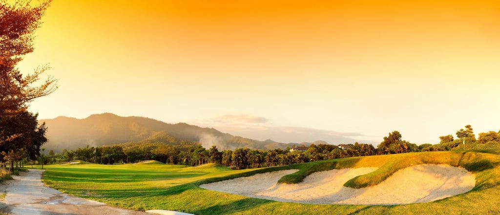 golf course at sunset with mountains in background golfing in downey ca