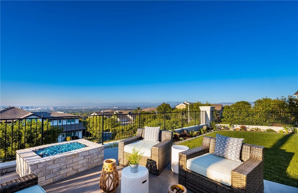 Backyard with fire table and endless city views in Irvine, CA