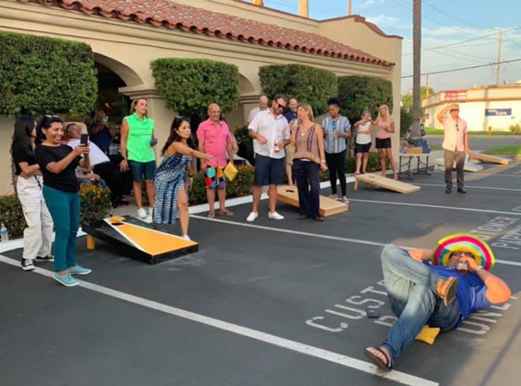 First Team Tustin Office Playing Cornhole