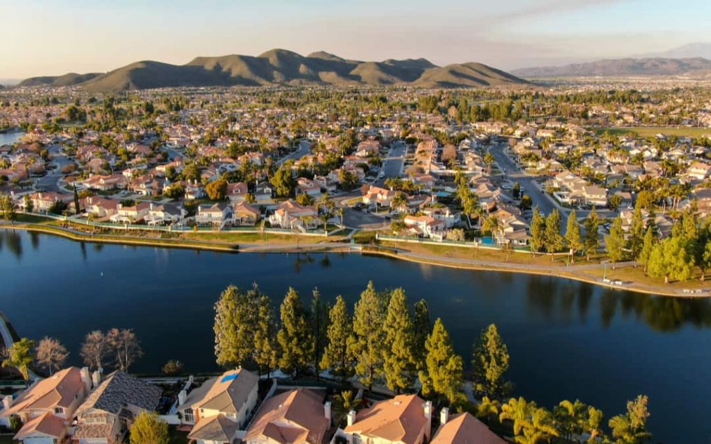 Aerial View Of Menifee Lake And Neighborhood, Residential Subdivision Vila During Sunset. Riverside County, California, United States