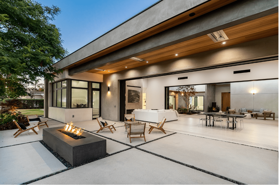 View Of Courtyard Opening To Outdoor Fire Pit On Golf Course